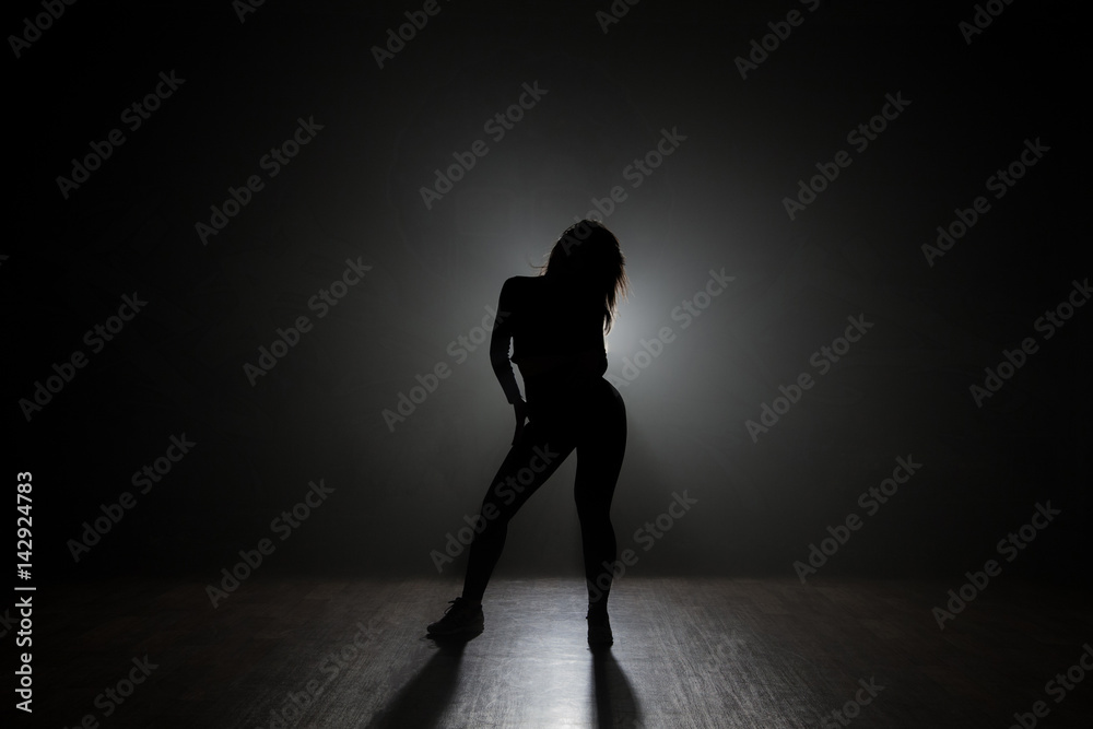 Dancer in the studio, silhouette. Dancer in the studio, silhouette.