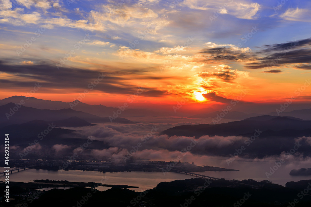 Sunrise on the mountain and foggy in Korea.