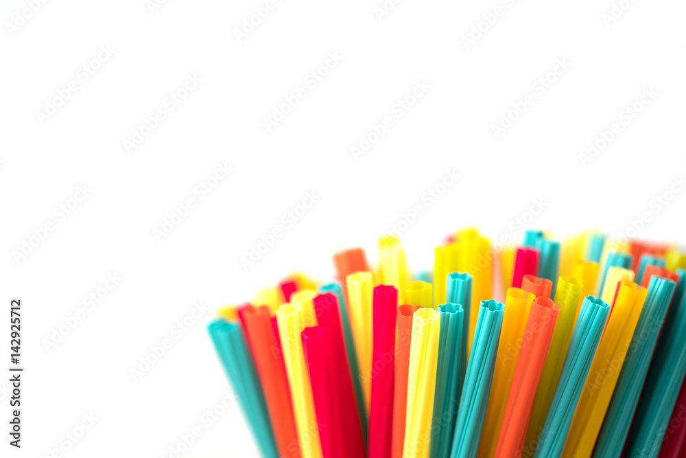Pile of colorful straws isolated with white background. Pile of colorful straws isolated with white background.
