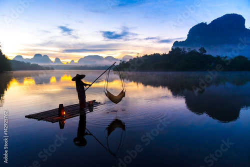 Fishing at Nong Talay in Krabi, Thailand in the morning. photo