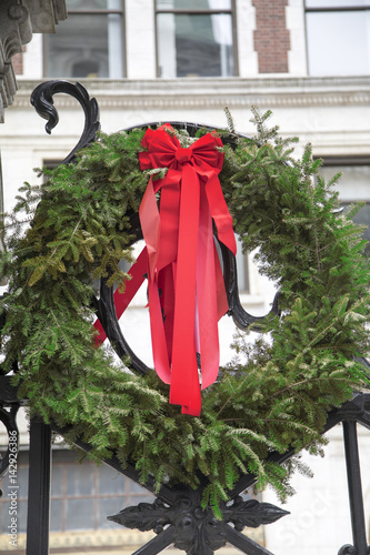 A Christmas wreath with red bow