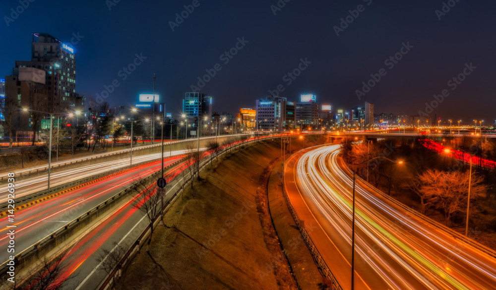 Light trails on a highway at night
