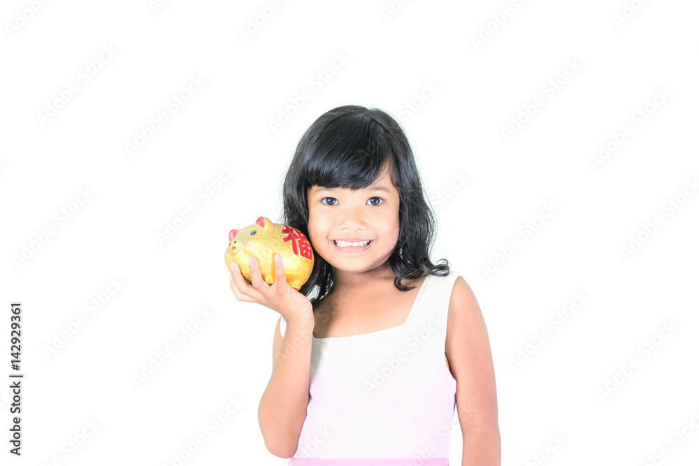 Young girl holding piggy bank on white background.saving money concept. Young girl holding piggy bank on white background.saving money concept.