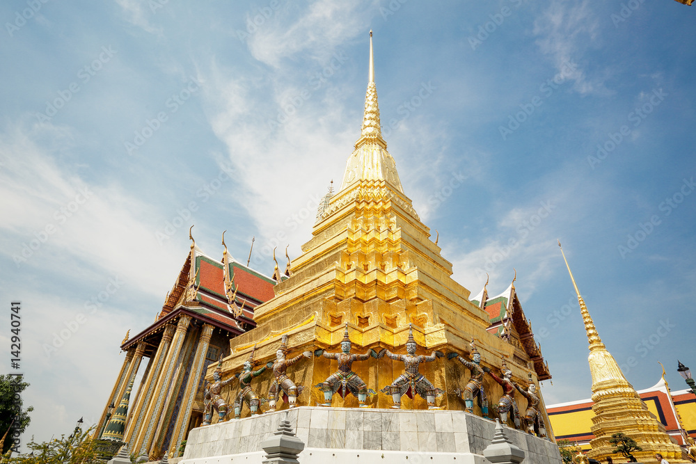 Fototapeta premium Pagoda under blue sky at bangkok royal palace