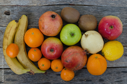 Fruits on wooden background