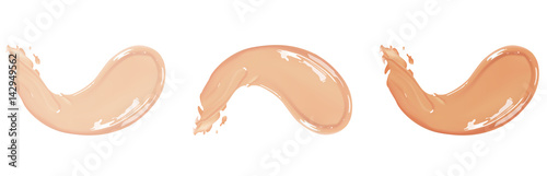 Cosmetic liquid foundation cream set in different colour smudge smear strokes. Make up smears isolated on white background.
