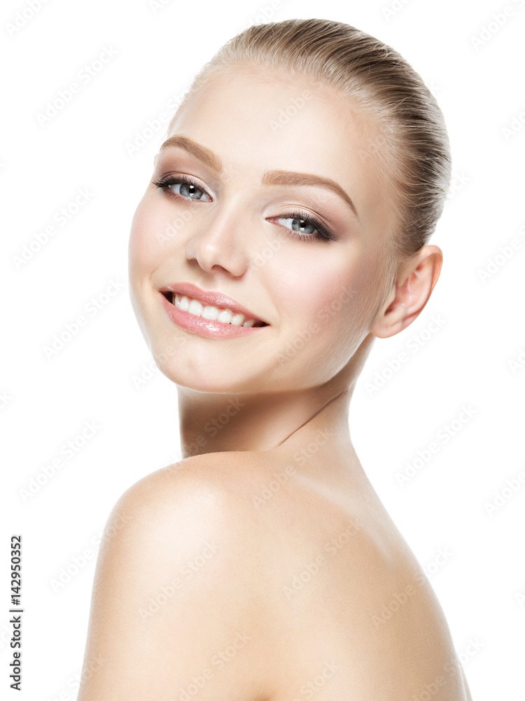 Obraz premium Beautiful face of smiling woman with clean fresh skin