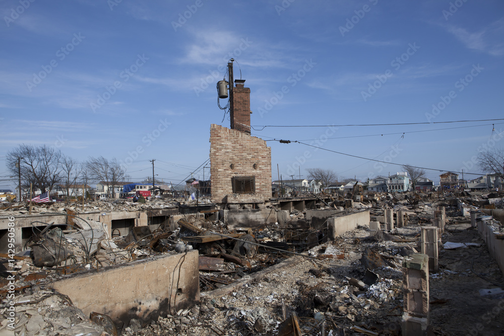 NEW YORK -November12: The fire destroyed around 100 houses during Hurricane Sandy in the flooded neighborhood at Breezy Point in Far Rockaway area  on October 29; 2012 in New York City; NY