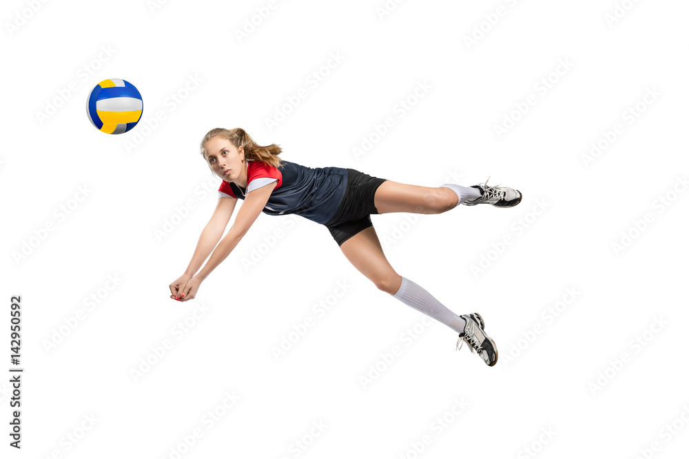 Fototapeta premium Female volleyball player hitting the ball