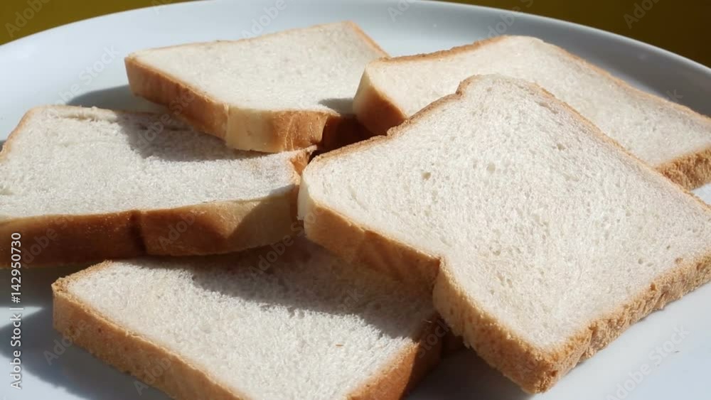 slices of toast bread on rotating plate
