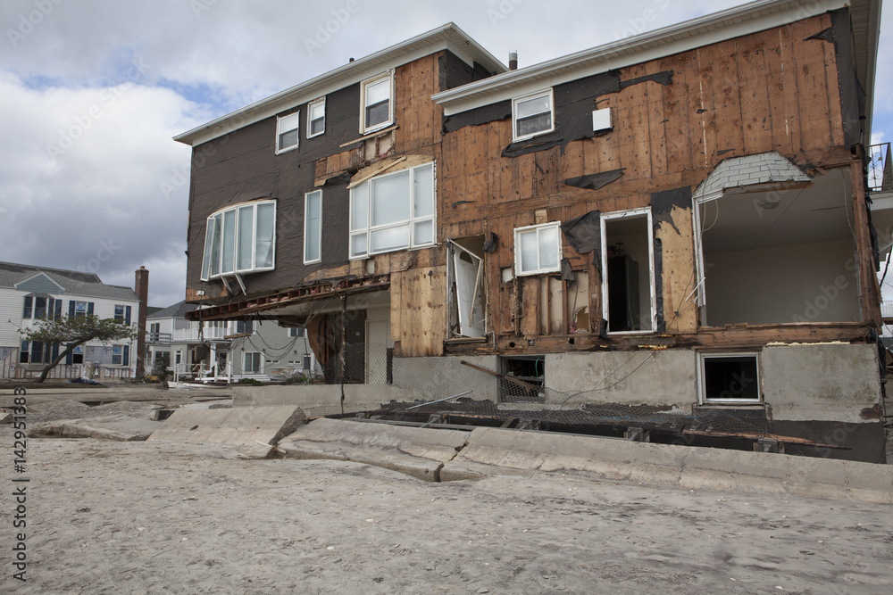 NEW YORK - October 31:Destroyed homes in Far Rockaway after Hurricane Sandy October 29, 2012 in New York City, NY NEW YORK - October 31:Destroyed homes in Far Rockaway after Hurricane Sandy October 29, 2012 in New York City, NY