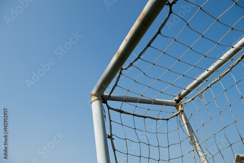 soccer goal against blue sky photo