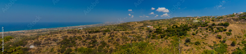 Agia Irini, Greece. July  27. 2016: Panoramic view to mountains from Agia Irini Monastery, wide panorama.