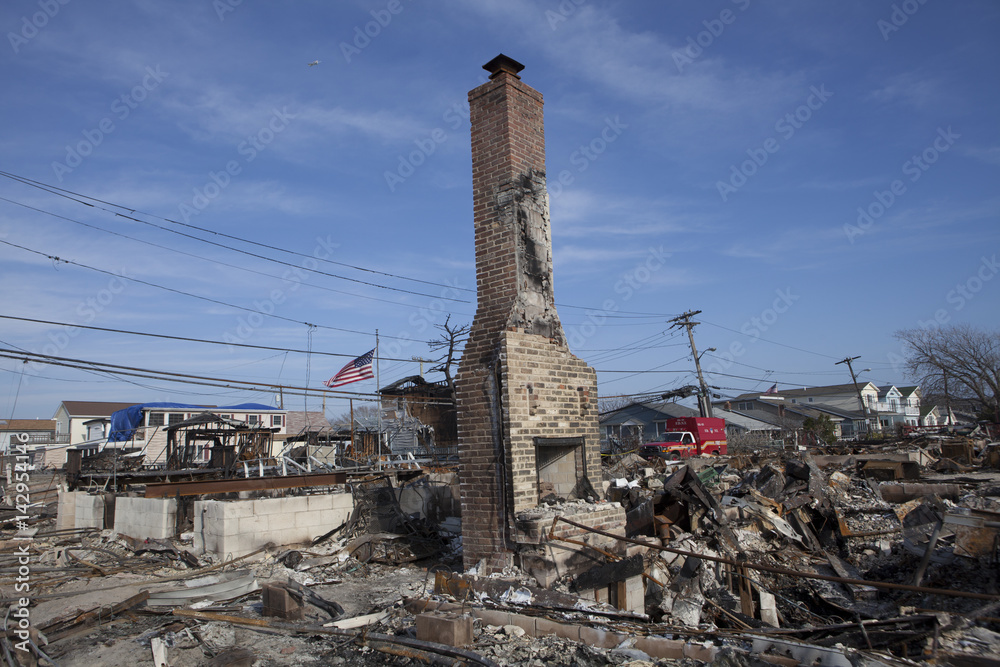 NEW YORK -November12: The fire destroyed around 100 houses during Hurricane Sandy in the flooded neighborhood at Breezy Point in Far Rockaway area on October 29; 2012 in New York City; NY