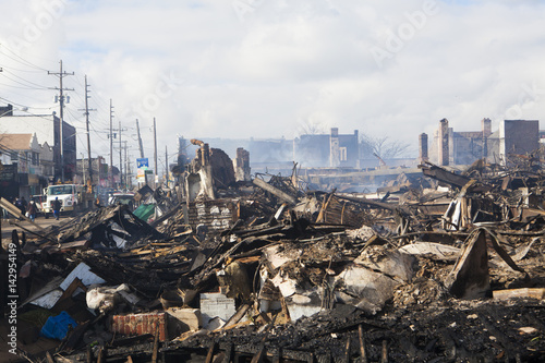 Homes sit smoldering after Hurricane Sandy  in the Far Rockaway area . Over 50 homes were reportedly destroyed in a fire during the storm on October 30; 2012 in New York City; NY