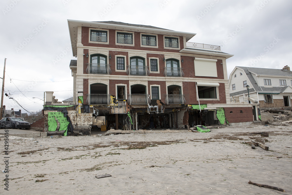 NEW YORK - October 31:Destroyed homes in Far Rockaway after Hurricane Sandy October 29, 2012 in New York City, NY NEW YORK - October 31:Destroyed homes in Far Rockaway after Hurricane Sandy October 29, 2012 in New York City, NY