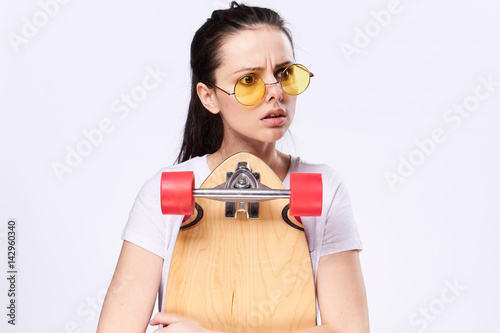 skateboard, woman with glasses photo