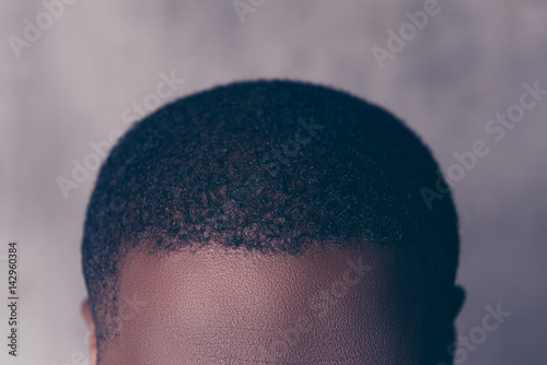 Close up cropped photo of afroamerican man's black hair