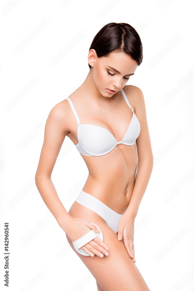 Young pretty woman in white underwear doing peeling Young pretty woman in white underwear doing peeling