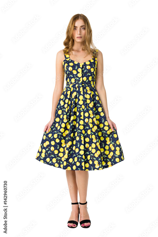 Young elegant female in light summer dress, over white background Young elegant female in light summer dress, over white background