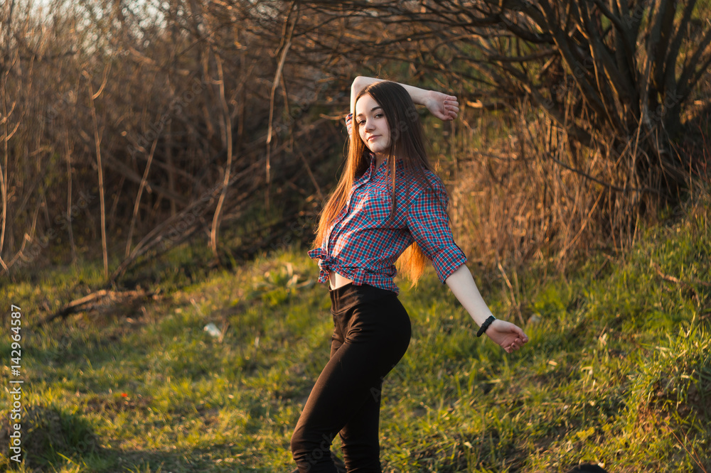 Young girl in nature, summer.
