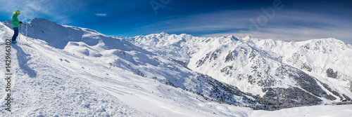 Man enjoying the stunning view before freeride skiing in famous ski resort in Tyrolian Alps, Zillertal, Austria © Eva Bocek