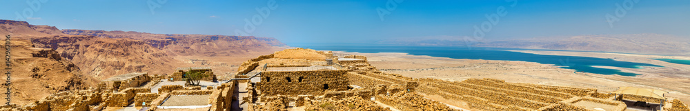 Ruins of Masada fortress and Dead Sea