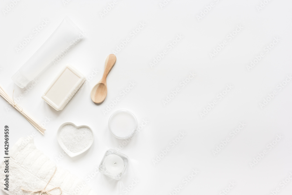 white set of cosmetics for spa on table background top view mockup white set of cosmetics for spa on table background top view mockup