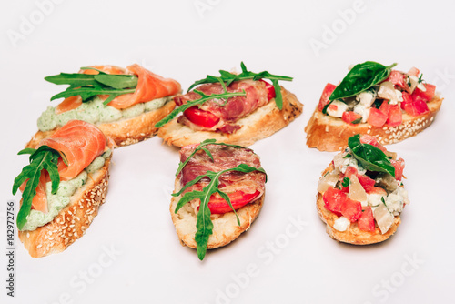 Wallpaper Mural Six bruschettes with greens, cheese, meat and fish Torontodigital.ca