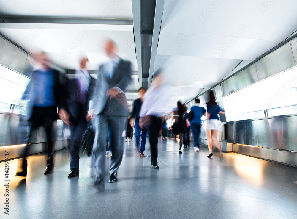 People rushing in the lobby. motion blur