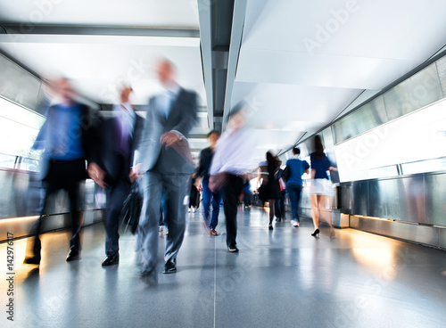 People rushing in the lobby. motion blur