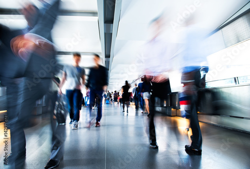 People rushing in the lobby. motion blur