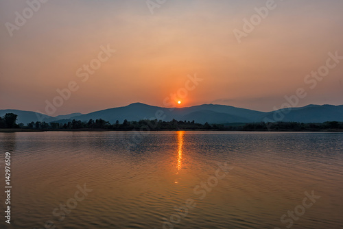 Huai Sak lake at sunset in Chiang Rai,Thailand © Prakiat