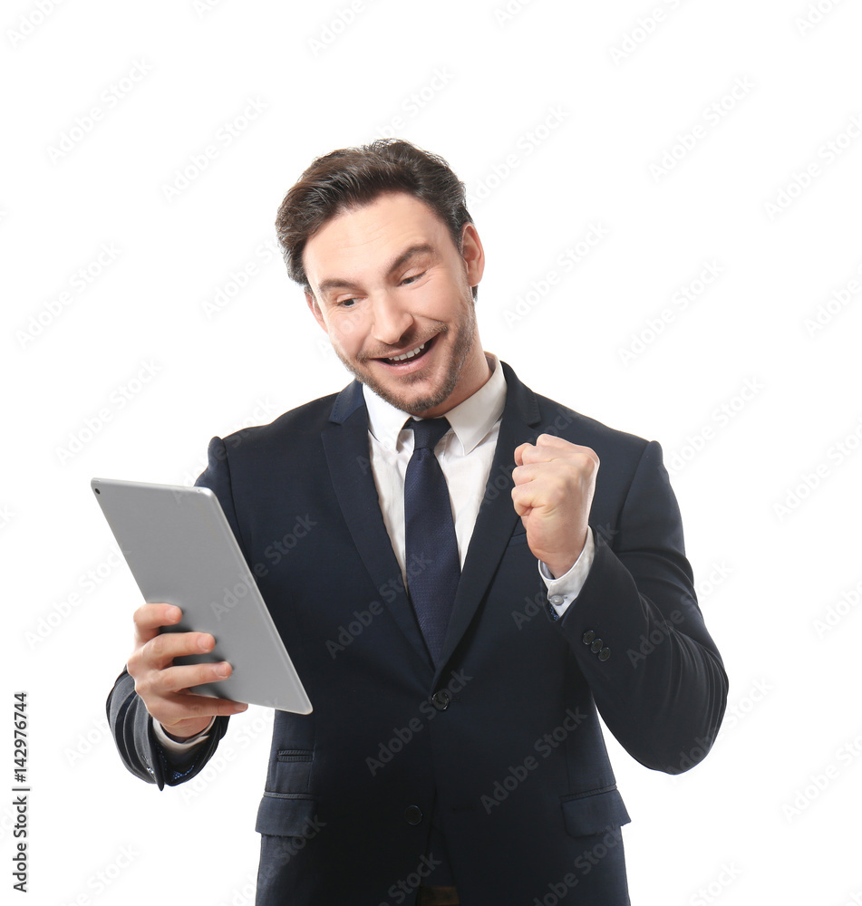 Handsome young man posing with tablet on white background Handsome young man posing with tablet on white background