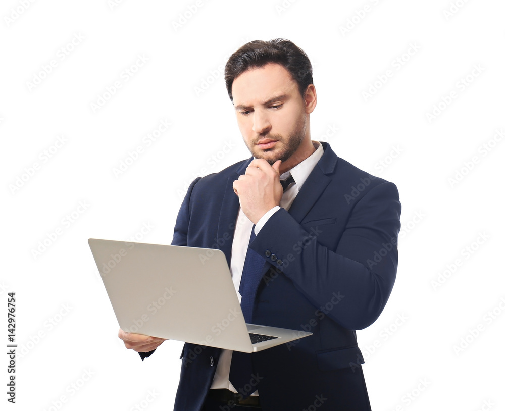 Handsome young man posing with laptop on white background Handsome young man posing with laptop on white background