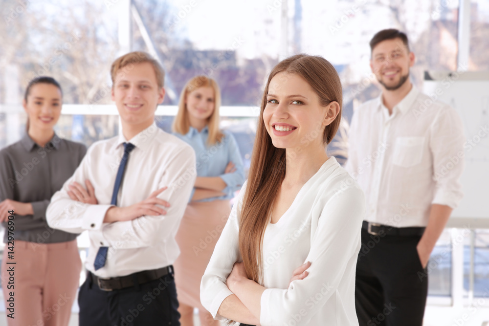 Young woman with group of people on background Young woman with group of people on background