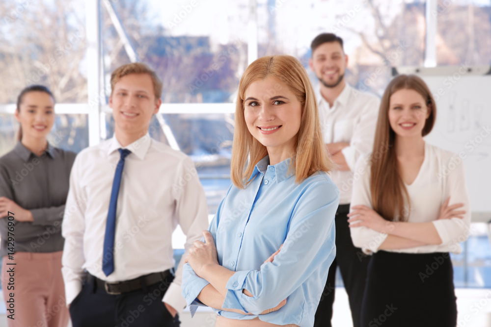 Young woman with group of people on background