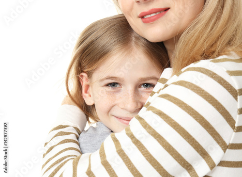 Cute girl with her mother o...