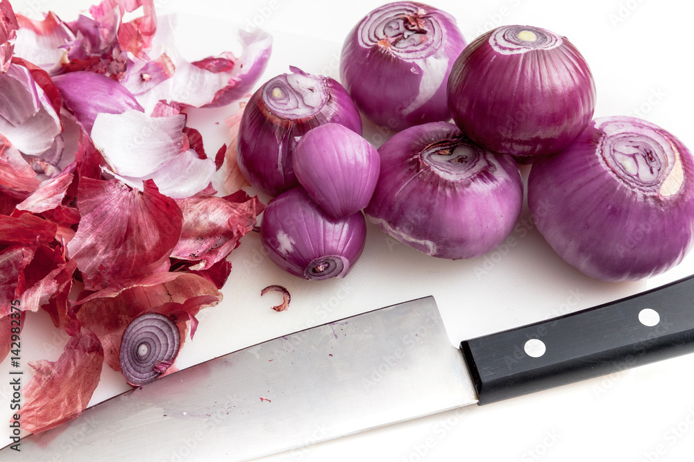 Peeling shallots prepare for cooking