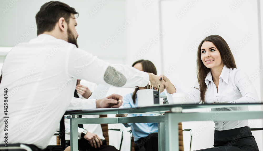 Obraz premium handshake between the Manager and the client after the signing o