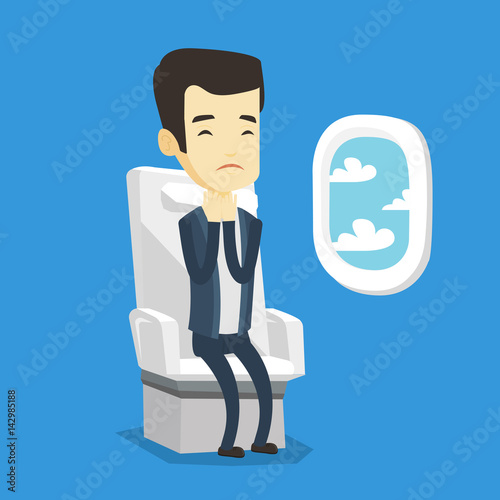 Young man suffering from fear of flying.