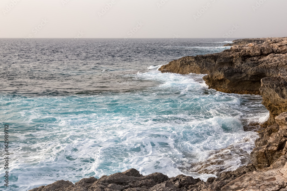 Waves sea cliffs cyprus