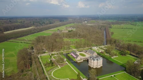 Aerial: Flying over Middachten medieval Castle in the Netherlands photo