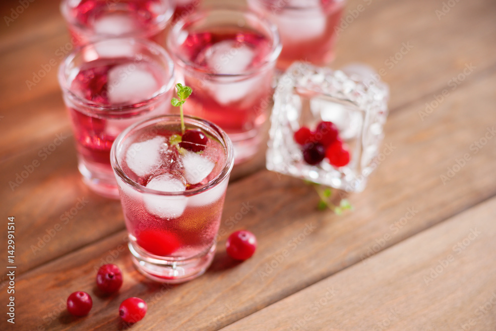 Shot with natural cranberry and vodka Shot with natural cranberry and vodka