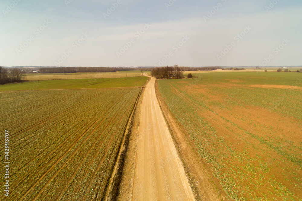 Fototapeta premium Agricultural fields in early spring, Latvia.