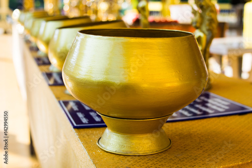 buddhist golden monk's alms