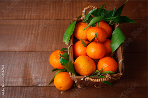 Fresh tangerines in old box