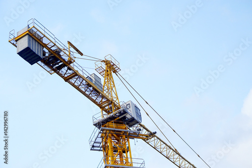 Wallpaper Mural Industrial Construction cranes tower on blue sky background. Torontodigital.ca