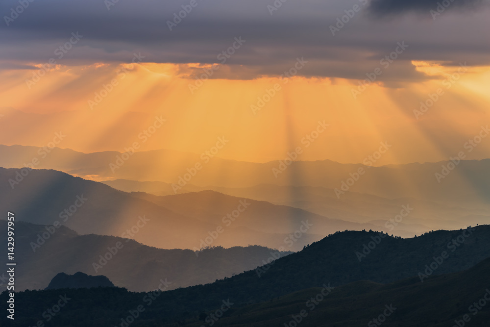 A beautiful sun rays with clouds in the morning used as for background

