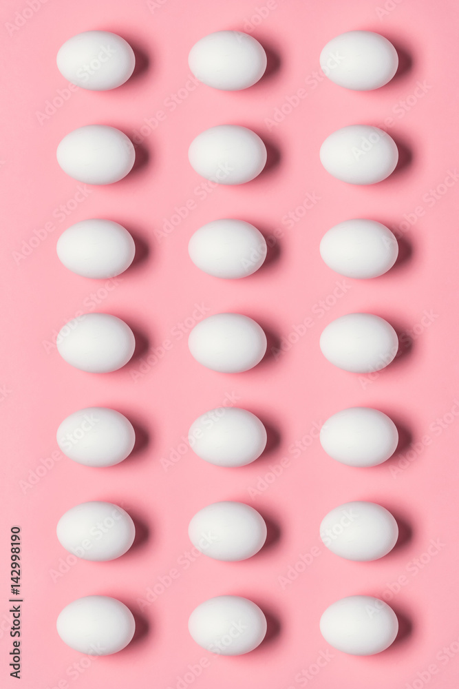 Top view of rows of white eggs for easter. Happy Easter concept